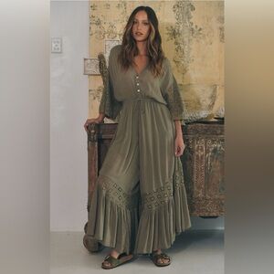 People movement jumpsuit/romper, green size medium. New with tags never worn.